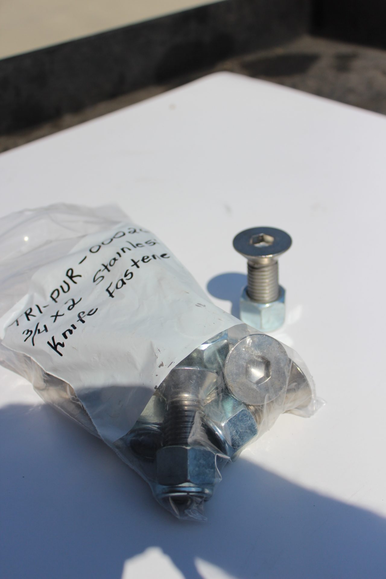 160-TRI-PUR-000268-A | IrrigationSupplyParts.com -- Irrigation Fittings, Camlock, Ringlock, Drip Irrigation, Valves, Gauges 3/4-10 x 2 Flat Socket Cap SS w/Nut for Rotary Knife Fastener (160-TRI-PUR-000268)